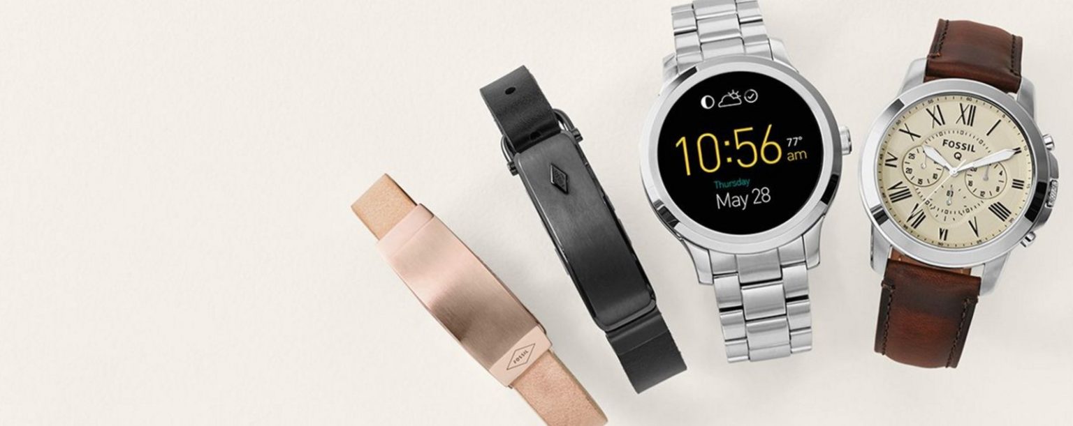 wearing watch and fitness tracker