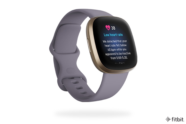 Fitbit smartwatch displaying heart rate information.