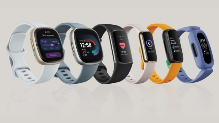 Fitbit Versa fitness tracker displaying health and fitness data.