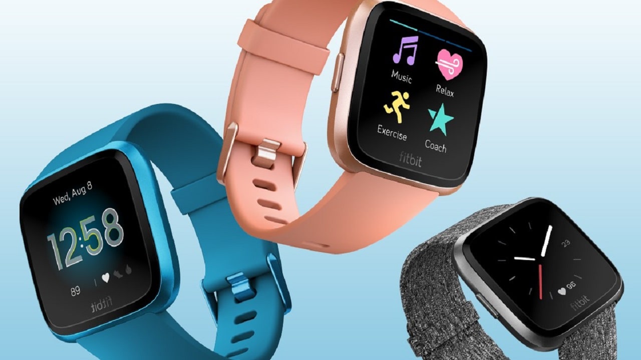 Fitbit Versa smartwatch displaying fitness and health tracking features.