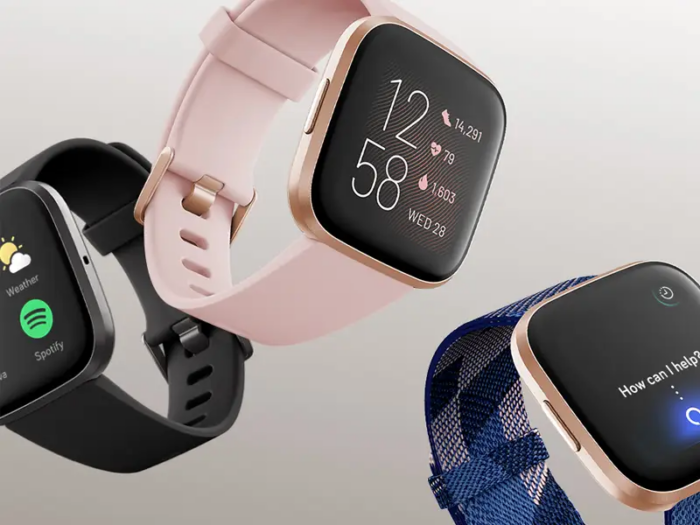 A Fitbit Versa smartwatch displaying fitness tracking features.