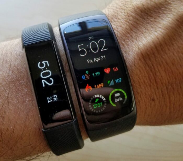 A Fitbit smartwatch displaying its fitness tracking features.