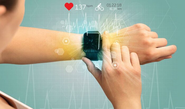 A heart rate monitoring device displaying a person's heart rate.