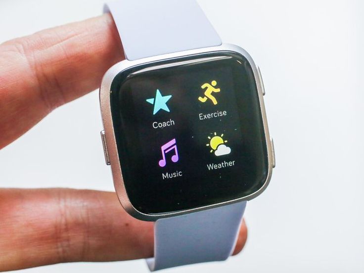 Fitbit Versa displaying music playback features.