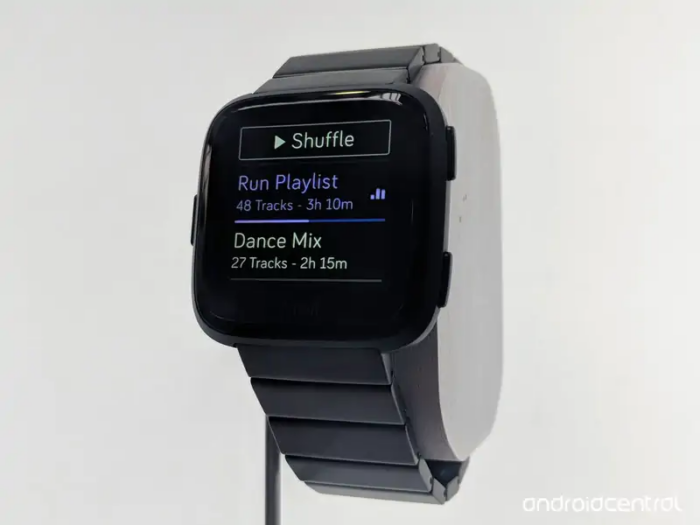 Fitbit Versa displaying music control features.