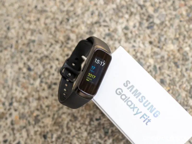 A Samsung Galaxy Fit smartwatch displaying its activity tracking features.