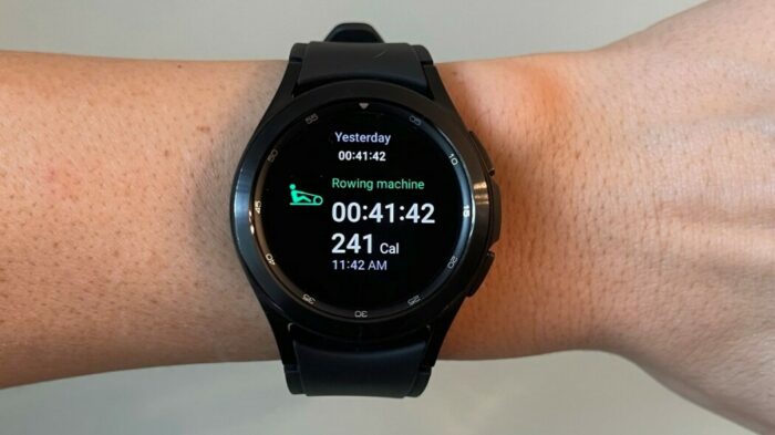 A Samsung Galaxy Watch 4 smartwatch displaying various features.