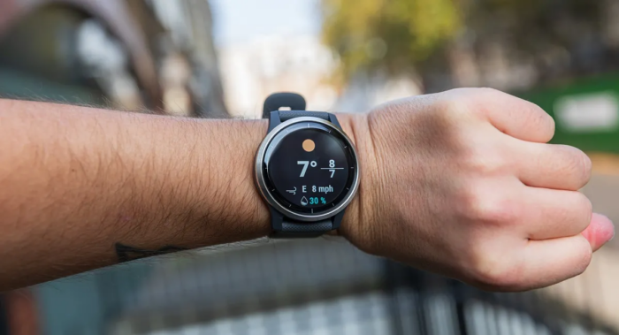 A Garmin Vivoactive 4 smartwatch displaying various fitness features.