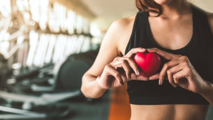 A person engaged in heart rate training during a workout.