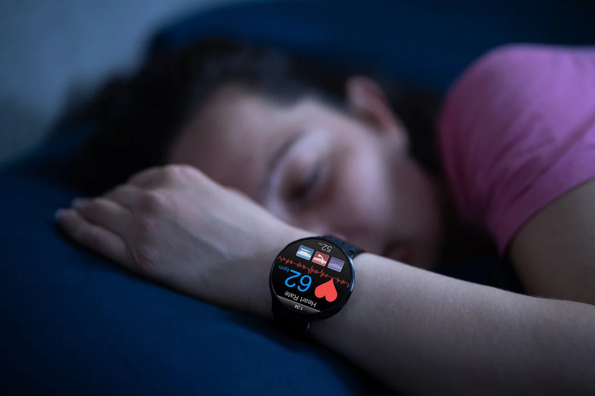 A sleep tracker displaying sleep quality and heart rate data.